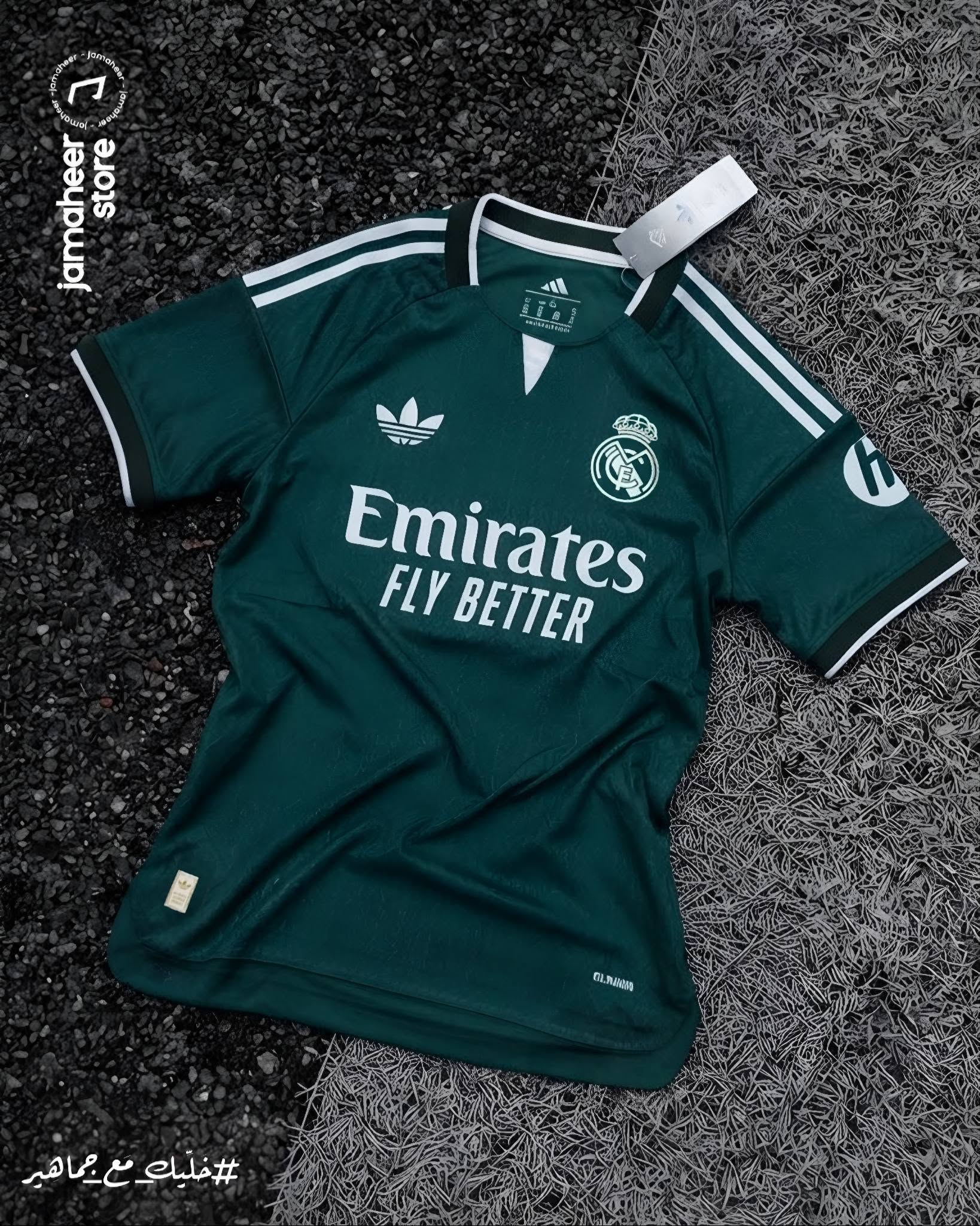 Green Real Madrid third kit laid on gravel